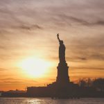 Canva - Silhouette of Statue of Liberty in a sunset
